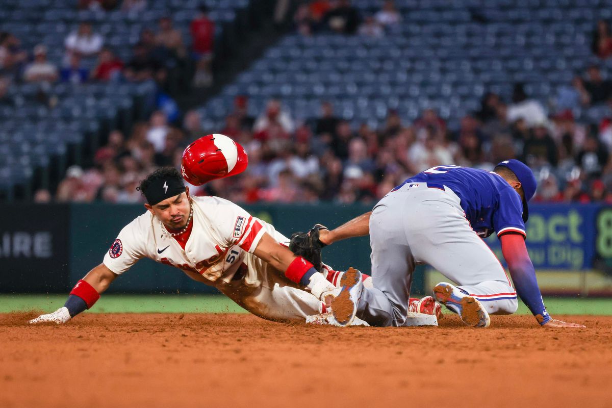 Los Angeles Angels outfielder Gustavo Campero (51) dives into second base during the MLB game against the Texas Rangers Tuesday July 29th, 2025 at Angel's Stadium in Anaheim, Calif.