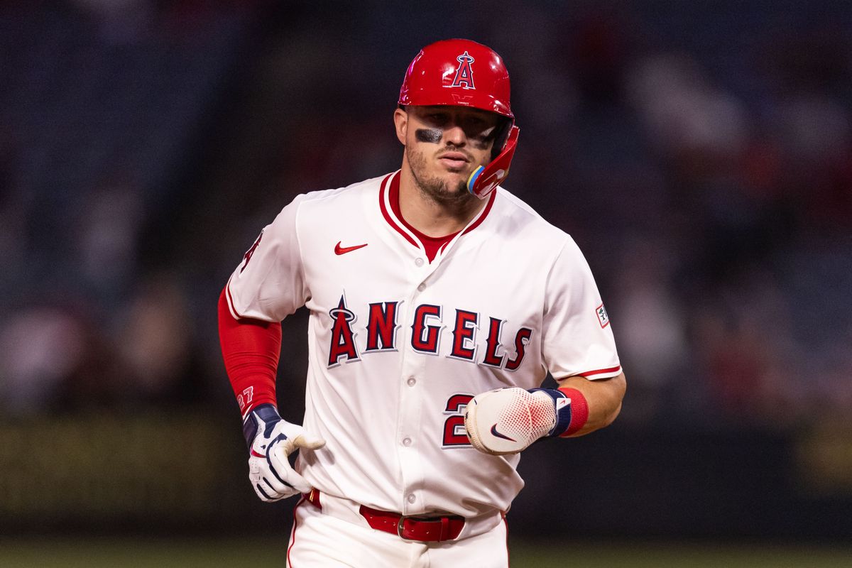 Los Angeles Angels outfielder Mike Trout (27) runs home from Los Angeles Angels first base Nolan Schanuel (18) home run hit during the MLB game against the Texas Rangers Tuesday July 30th, 2025 at Angel's Stadium in Anaheim, Calif. Los Angeles Angels outfielder Mike Trout (27) runs home from Los Angeles Angels first base Nolan Schanuel (18) home run hit during the MLB game against the Texas Rangers Tuesday July 30th, 2025 at Angel's Stadium in Anaheim, Calif.