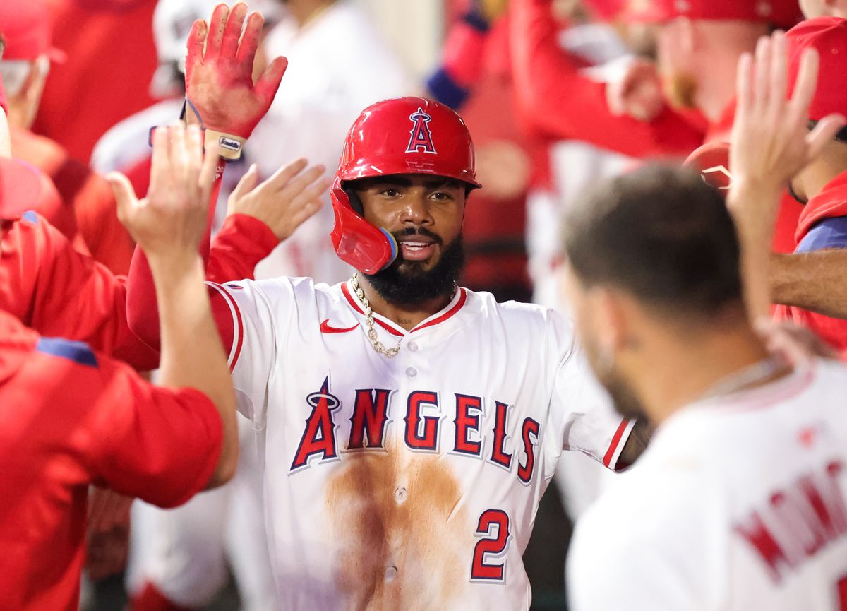 #2 Luis Rengifo of the Los Angeles Angels celebrates in the dug out with teammates during an MLB game against the Chicago White Sox on August 1, 2025 in Anaheim, CA.