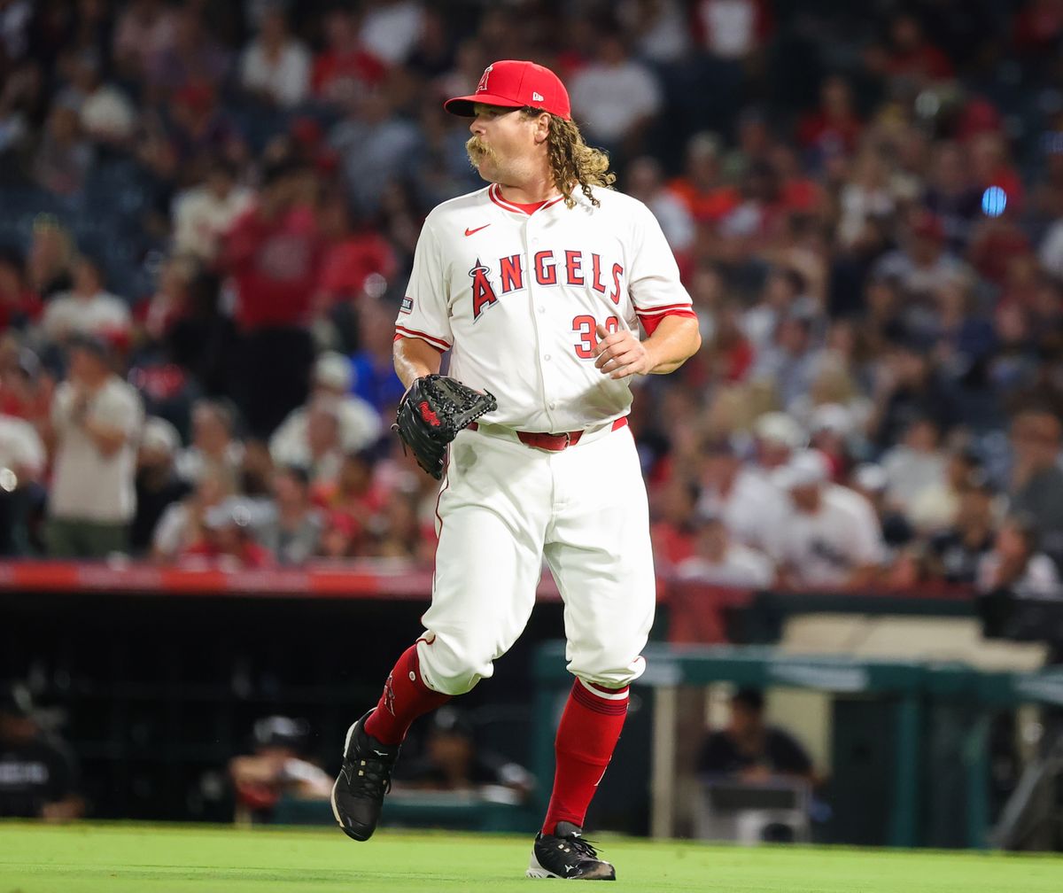 #39 Andrew Chafin of the Los Angeles Angels returns to the dugout during an MLB game against the Chicago White Sox on August 1, 2025 in Anaheim, CA.
