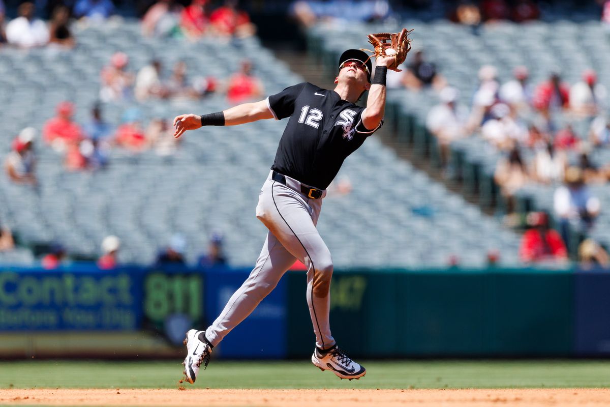 Colson Montgomery #12 of the Chicago White Sox catches the ball during the game against the Los Angeles Angels at Angel Stadium of Anaheim on August 3, 2025 in Anaheim, California. 
