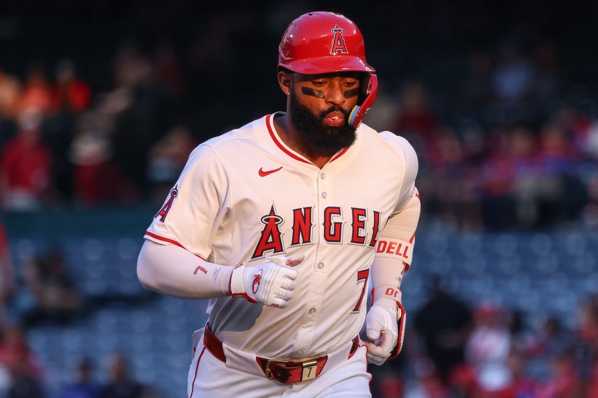 Los Angeles Angels outfielder Jo Adell (7) runs into the dugout during the MLB game against the Tampa Bay Rays Tuesday August 5th, 2025 at Angel's Stadium in Anaheim, Calif.