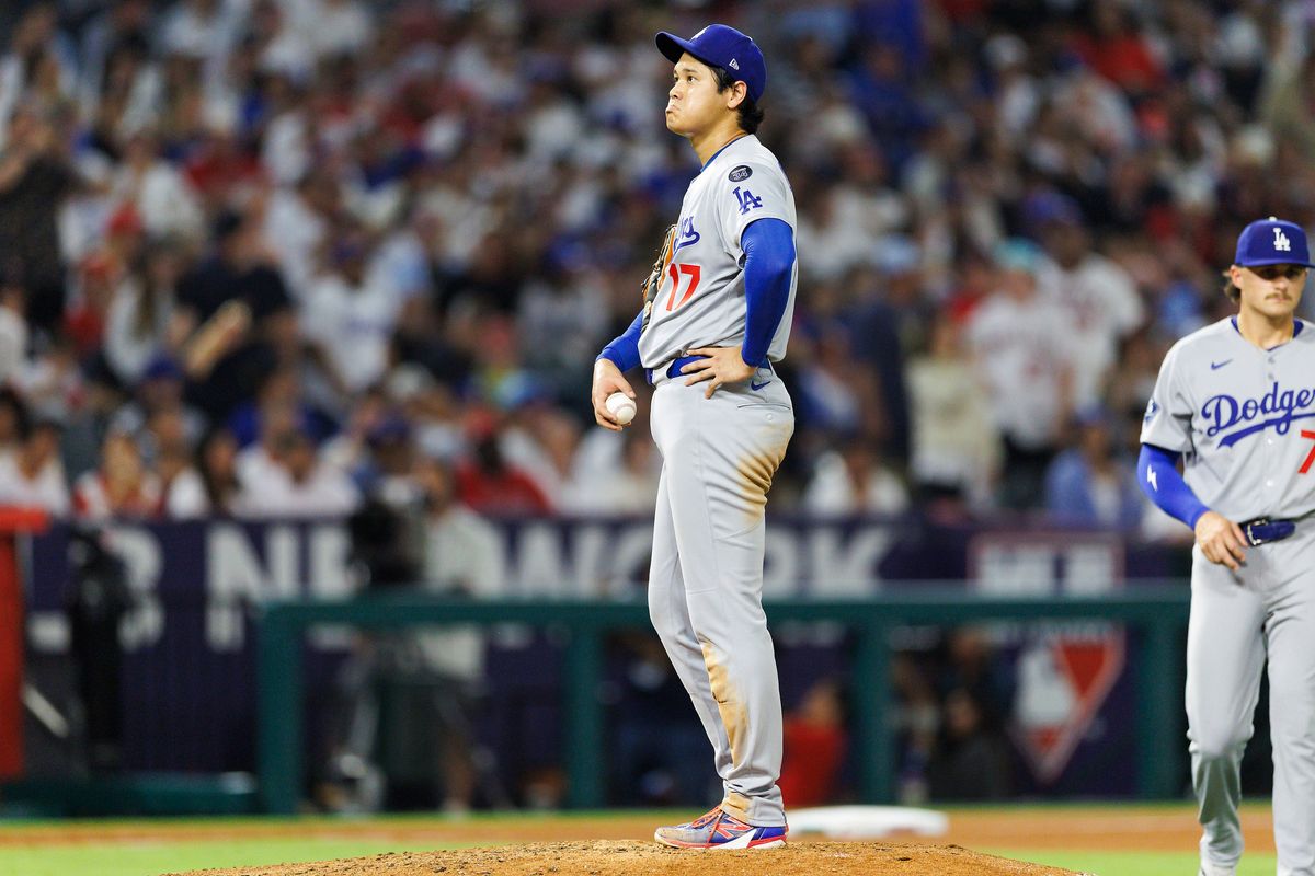 Shohei Ohtani #17 of the Los Angeles Dodgers reacts on the mound during the game against the Los Angeles Angels at Angel Stadium of Anaheim on August 13, 2025 in Anaheim, California.