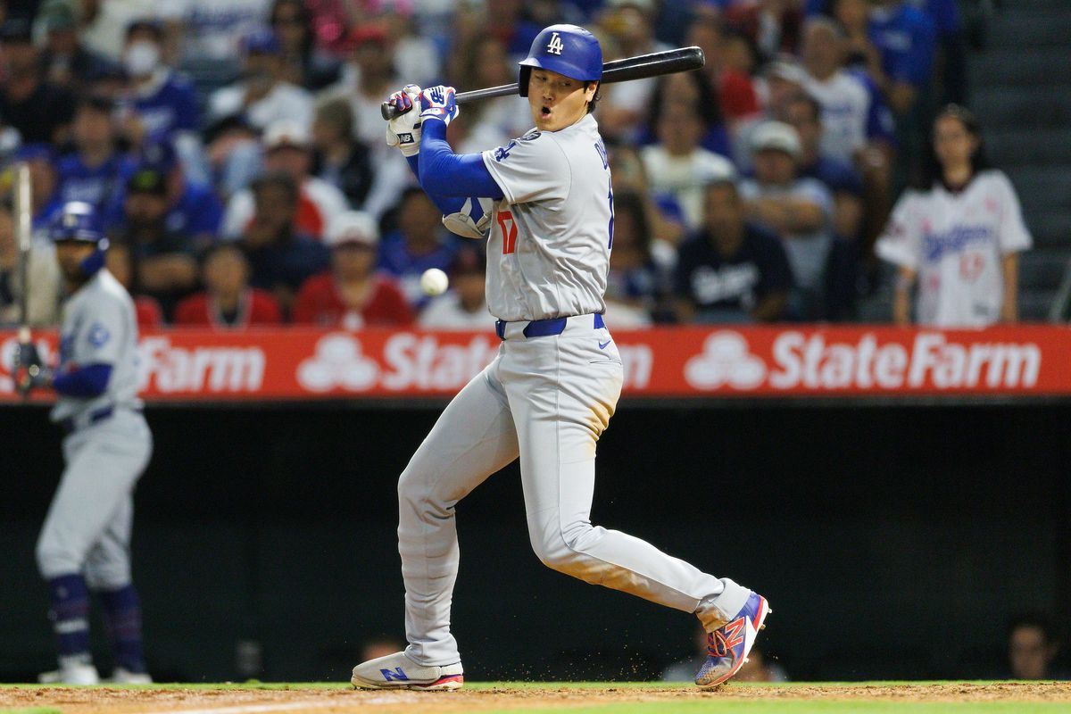 Shohei Ohtani #17 of the Los Angeles Dodgers reacts to a foul ball during the game against the Los Angeles Angels at Angel Stadium of Anaheim on August 13, 2025 in Anaheim, California.