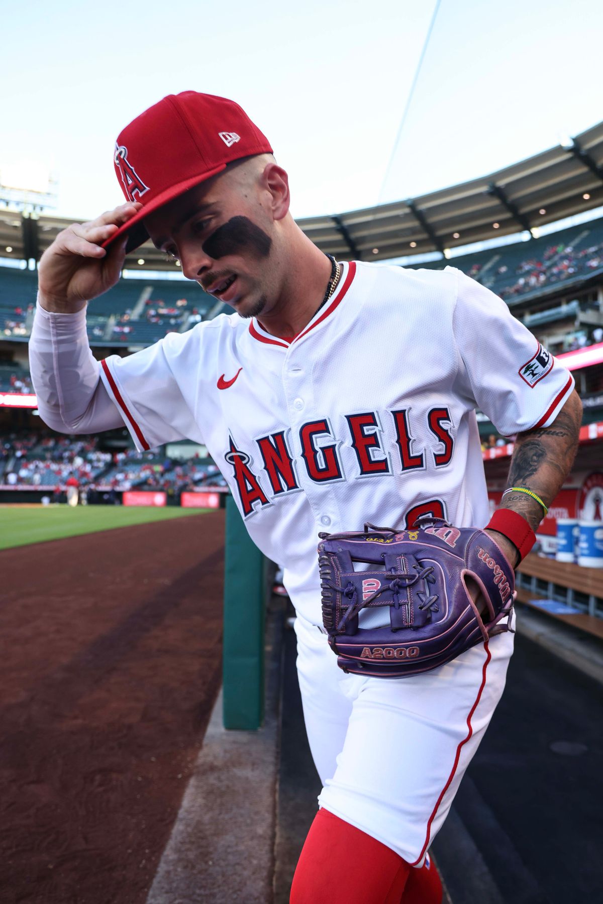 Los Angeles Angels infielder Zach Neto (9) runs out of the dugout before the MLB game against the Cincinnati Reds Monday August 18th, 2025 at Angel's Stadium in Anaheim, Calif.