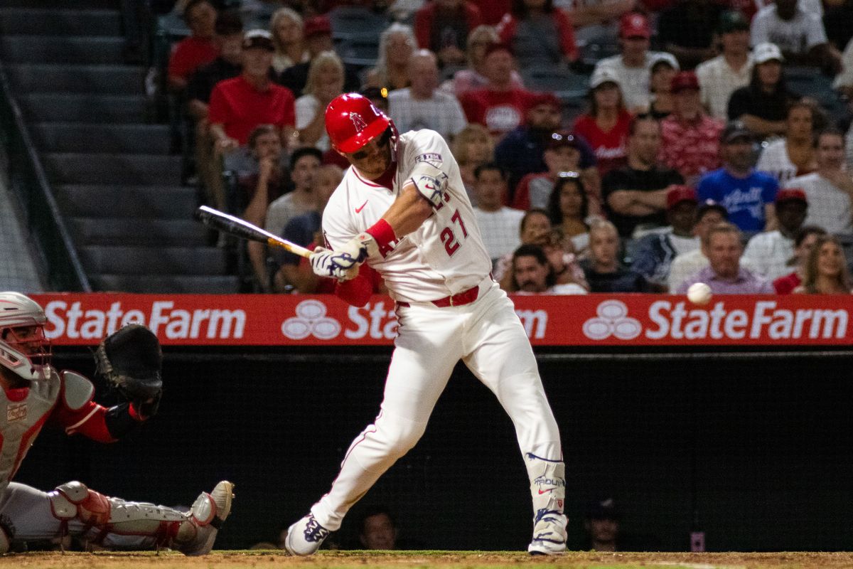 Los Angeles Angels Designated Hitter Mike Trout (17) lines the ball for a base hit in an MLB game against the Cincinnati Reds, Wednesday, August 20, 2025 at Angels Stadium in Anaheim, California.