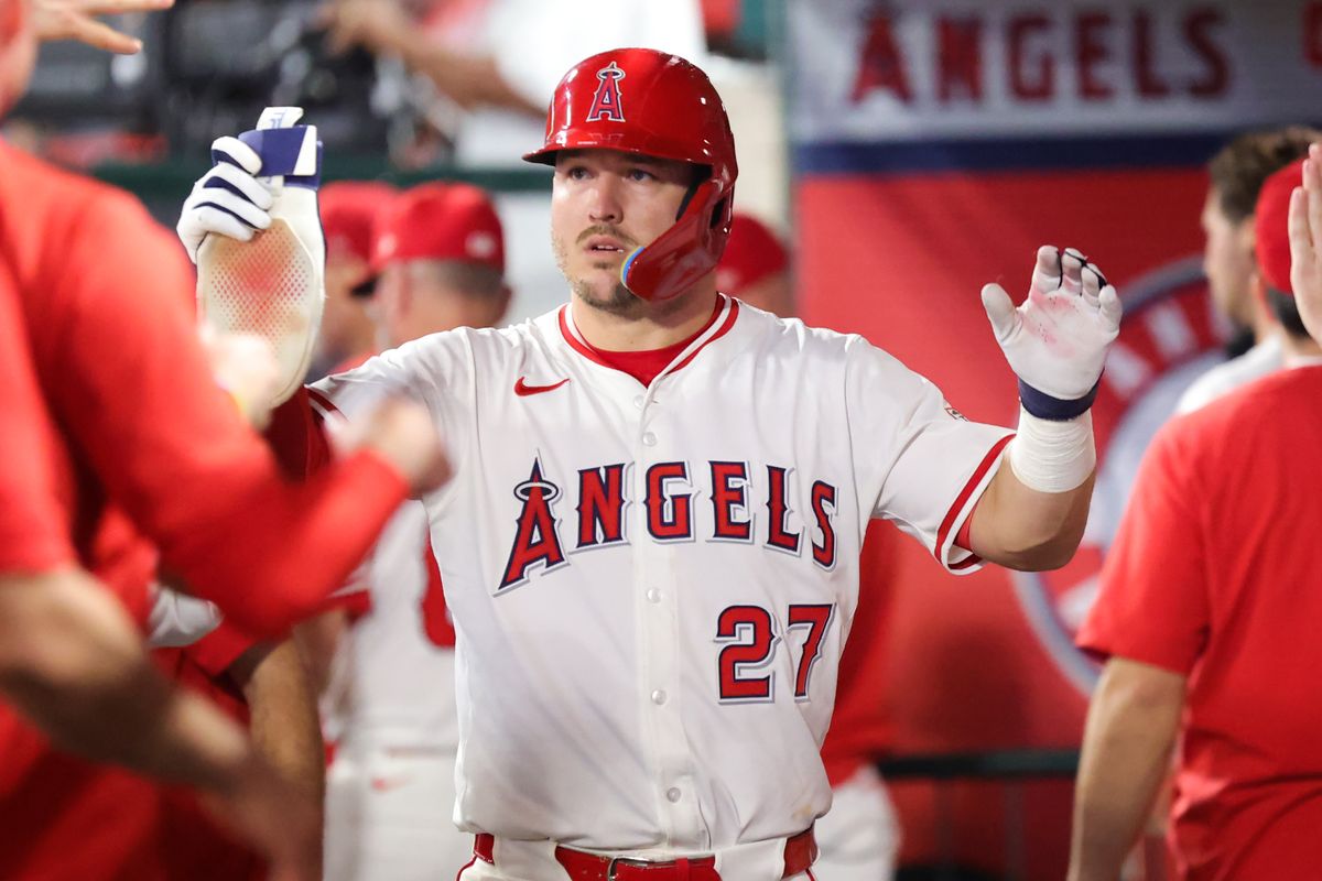 #27 Mike Trout of the Los Angeles Angels celebrates a scored run with teammates during an MLB game against the Minnesota Twins Tuesday September 9, 2025 in Anaheim, CA. #27 Mike Trout of the Los Angeles Angels celebrates a scored run with teammates during an MLB game against the Minnesota Twins Tuesday September 9, 2025 in Anaheim, CA.