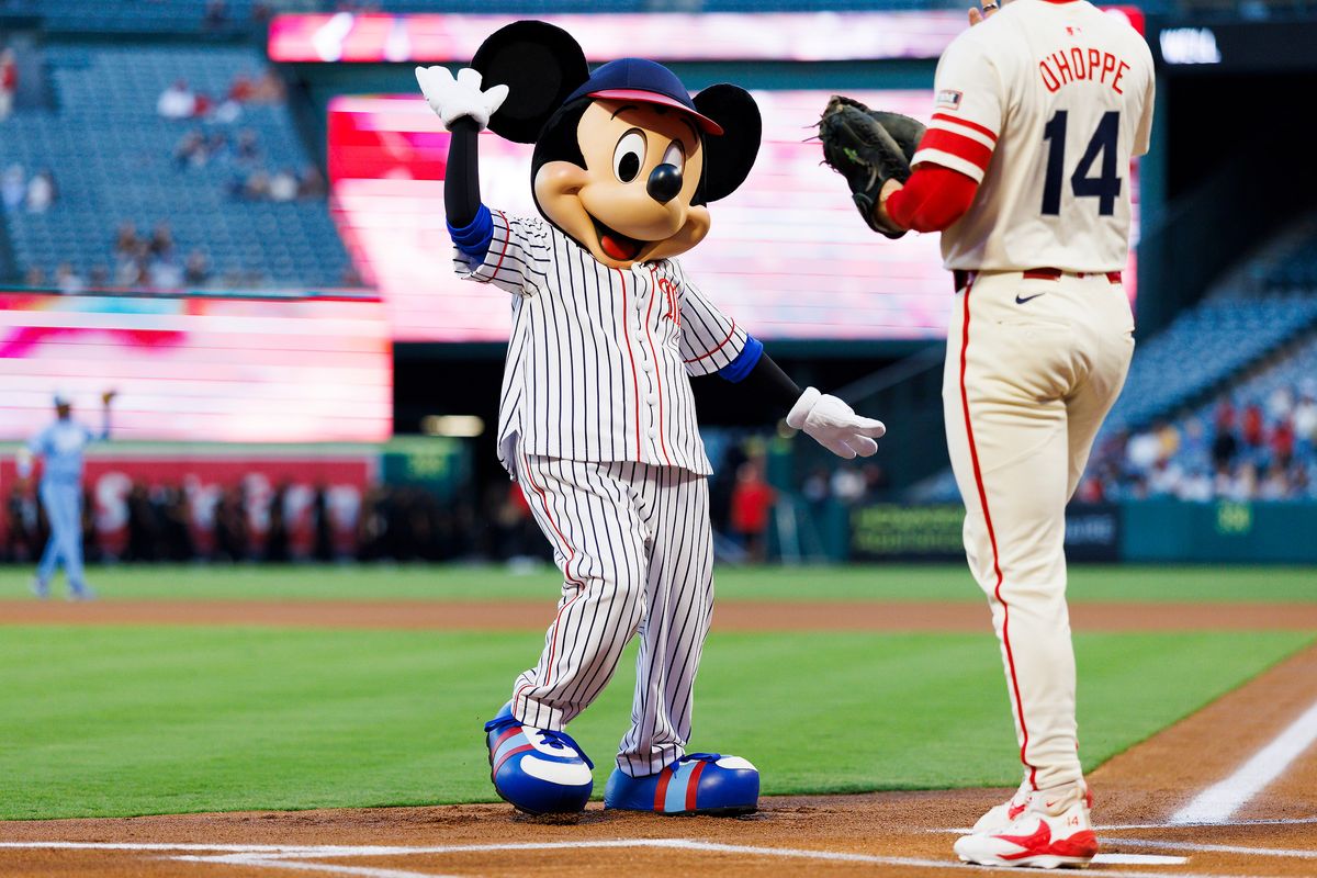 Mikey Mouse throws out the first pitch to Logan O’Hoppe #14 of the Los Angeles Angels during the game against the Kansas City Royals at Angel Stadium of Anaheim on September 24, 2025 in Anaheim, California. Mikey Mouse throws out the first pitch to Logan O’Hoppe #14 of the Los Angeles Angels during the game against the Kansas City Royals at Angel Stadium of Anaheim on September 24, 2025 in Anaheim, California.