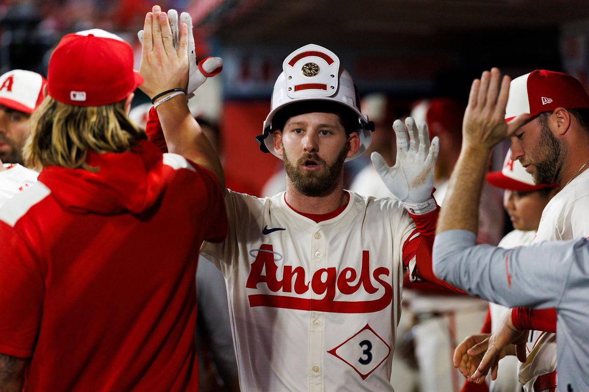 Taylor Ward #3 of the Los Angeles Angels celebrates in the dugout during the game against the Kansas City Royals at Angel Stadium of Anaheim on September 24, 2025 in Anaheim, California. Taylor Ward #3 of the Los Angeles Angels celebrates in the dugout during the game against the Kansas City Royals at Angel Stadium of Anaheim on September 24, 2025 in Anaheim, California.