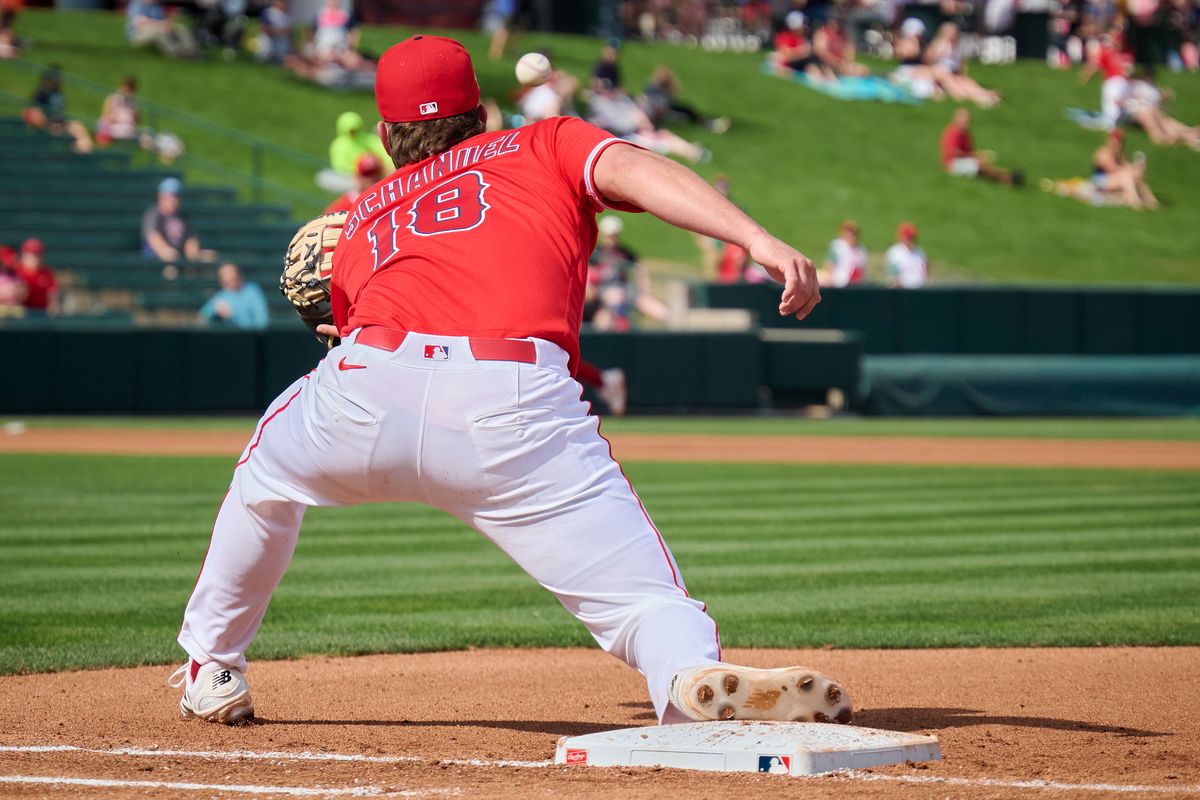 The Los Angeles Angels first baseman Nolan Schanuel (18)  gets the out at first against The Texas Rangers ,February 23rd, 2026 in Tempe  Arizona.