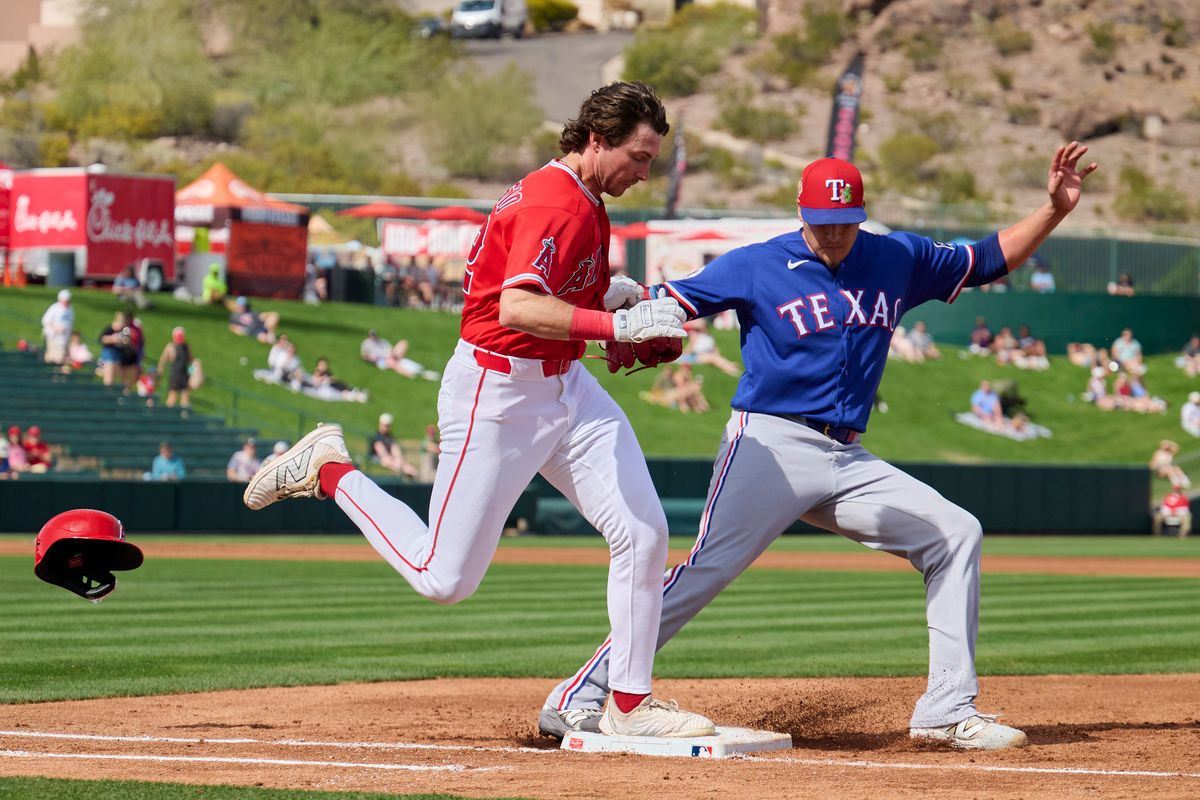 The Los Angeles Angels right fielder Bryce Teodosio (22) runs to first against The Texas Rangers ,February 23rd, 2026 in Tempe  Arizona.