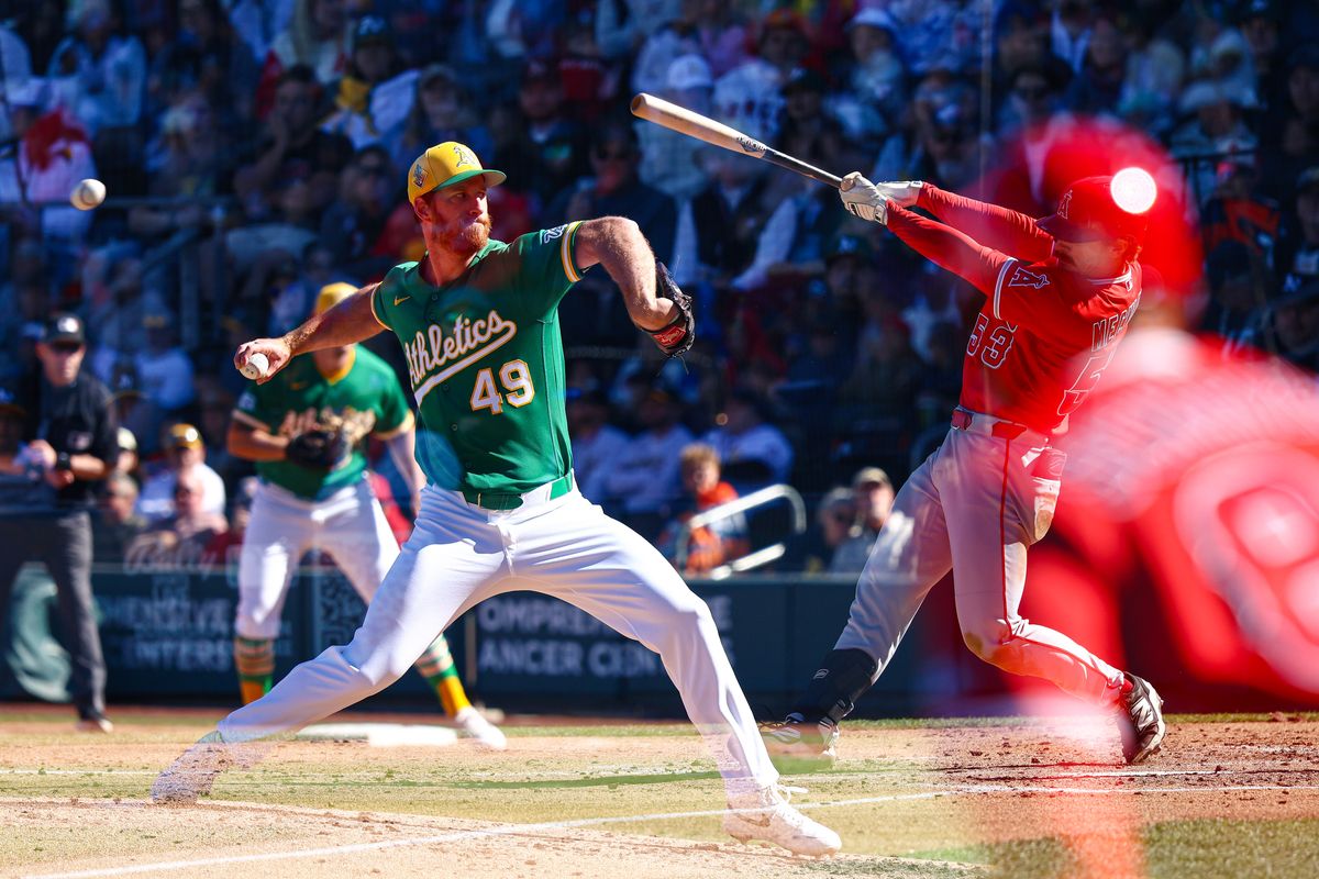 Los Angeles Angels OF Wade Meckler (53) hits a single against Athletics RHP Michael Kelly (49) during an MLB Spring Training game on Saturday March 7, 2026, in Las Vegas, Nevada. 