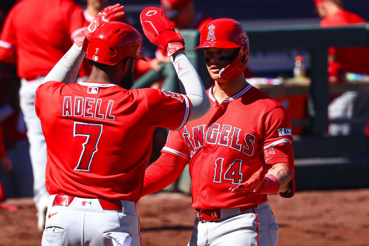 Los Angeles Angels OF Jo Adell (7) high fives his teammate C Logan O'Hoppe (14) after O'Hoppe hit a two-run home run against the Athletics on Sunday March 8, 2026, in Las Vegas, Nevada. 