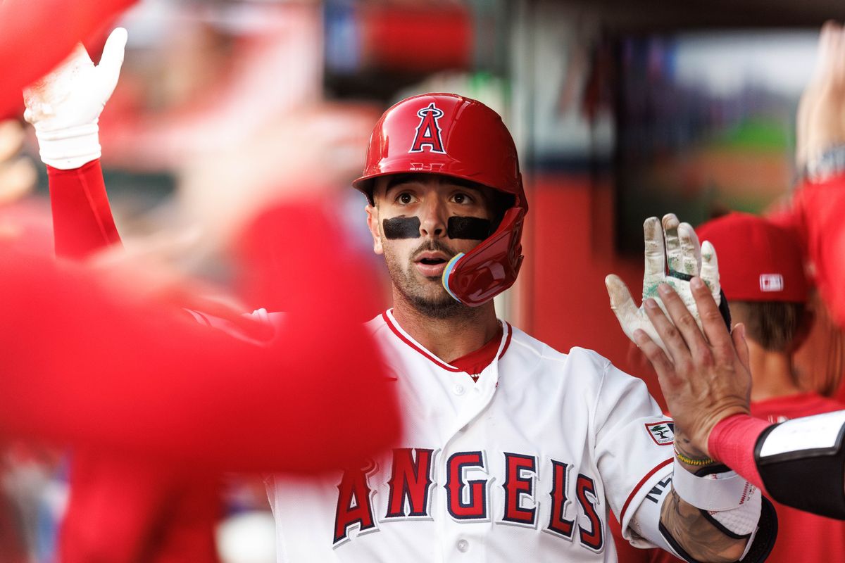 Los Angeles Angels shortstop Zach Neto (9) celebrates in the dugout after hitting a home run during an MLB game against the Atlanta Braves, Monday April 6, 2026, in Los Angeles, Calif.