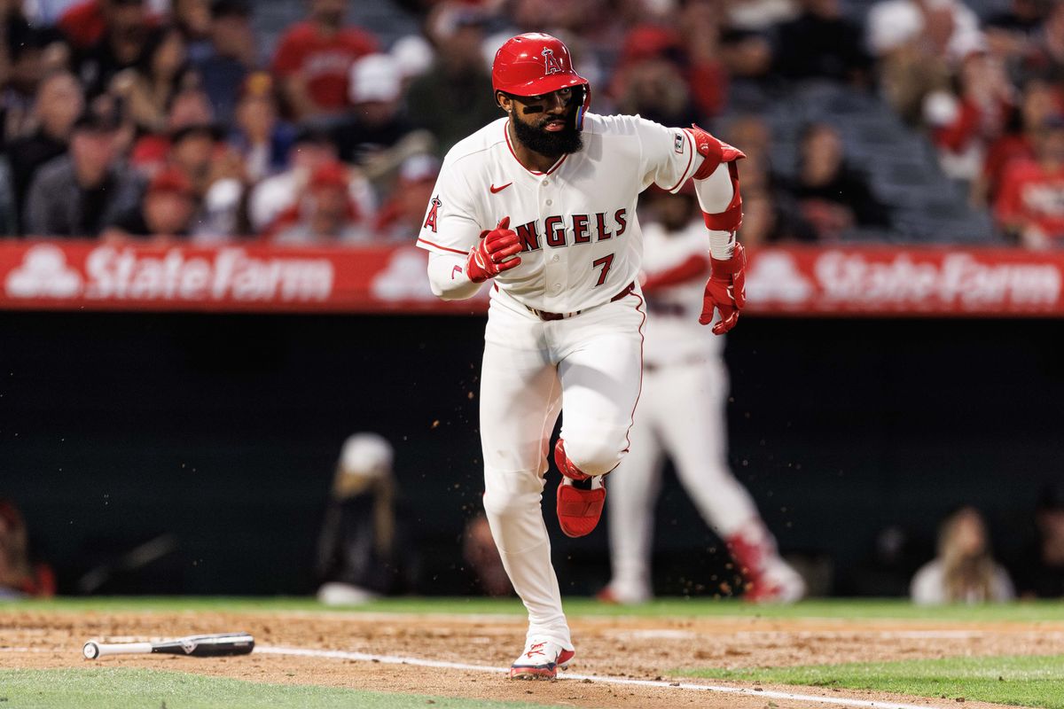 Los Angeles Angels center fielder Jo Adell (7) makes it on to first during an MLB game against the Atlanta Braves, Monday April 6, 2026, in Los Angeles, Calif.