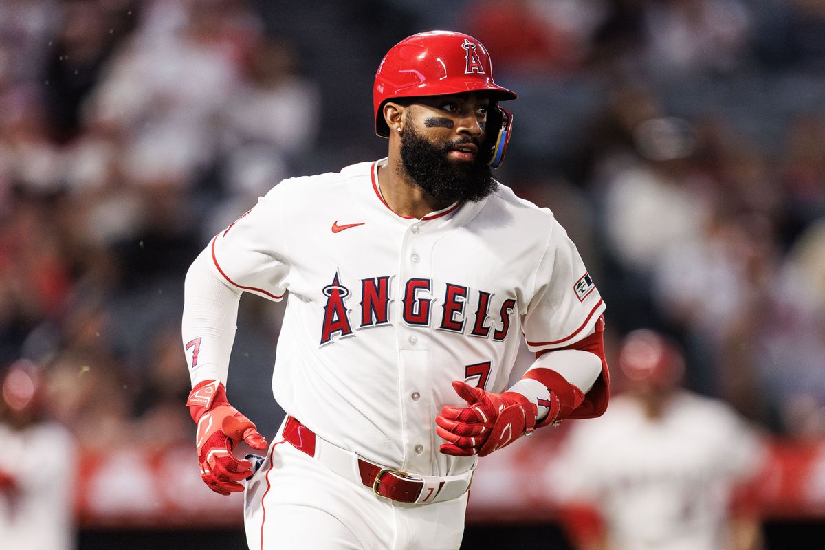 Los Angeles Angels center fielder Jo Adell (7) makes it on to first base during an MLB game against the Atlanta Braves, Monday April 6, 2026, in Los Angeles, Calif.