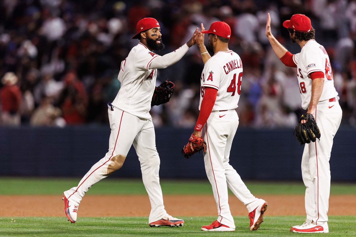 Los Angeles Angels center fielder Jo Adell (7) celebrates with teammates after winning the MLB game against the Atlanta Braves, Monday April 6, 2026, in Los Angeles, Calif.