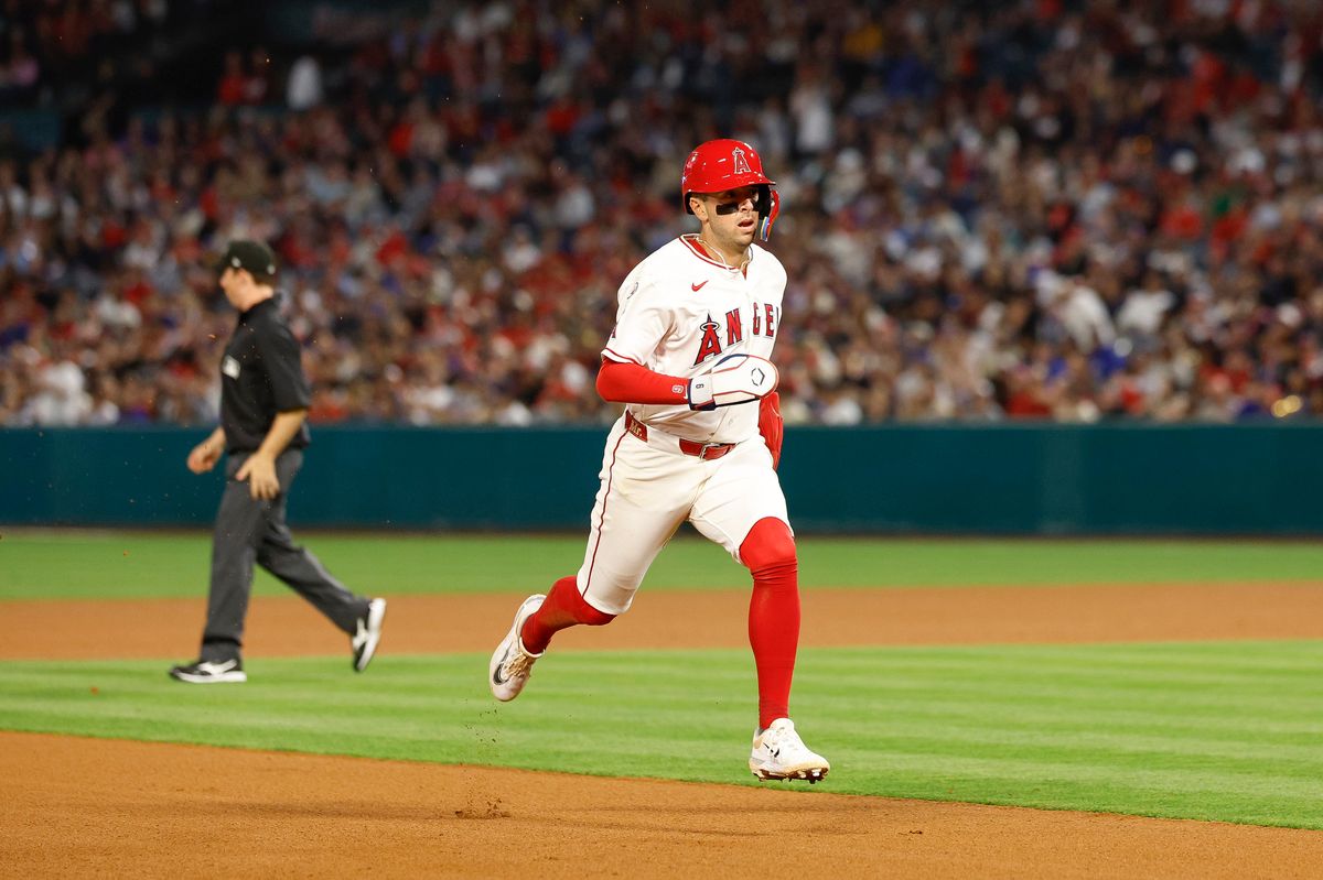 Zach Neto #9 of the Los Angeles Angels runs to third base against the New York Mets at Angel Stadium on May 2, 2026, in Anaheim, California.