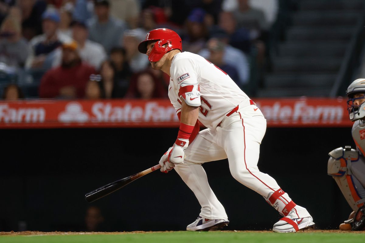 Mike Trout #27 of the Los Angeles Angels hits a single against the New York Mets at Angel Stadium on May 2, 2026, in Anaheim, California.