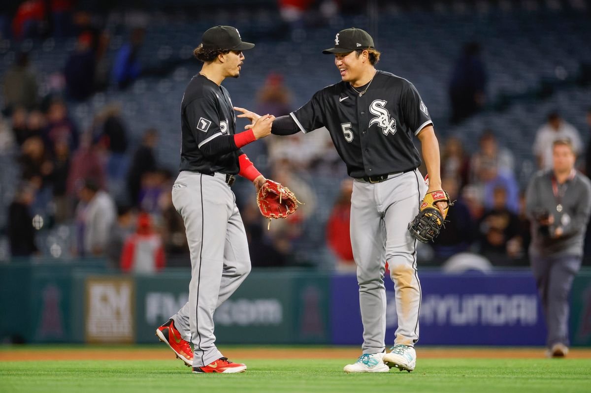 Munetaka Murakami #5 of the Chicago White Sox celebrates a team victory with Miguel Vargas #20 over the Los Angeles Angels at Angel Stadium on May 4, 2026, in Anaheim, California.