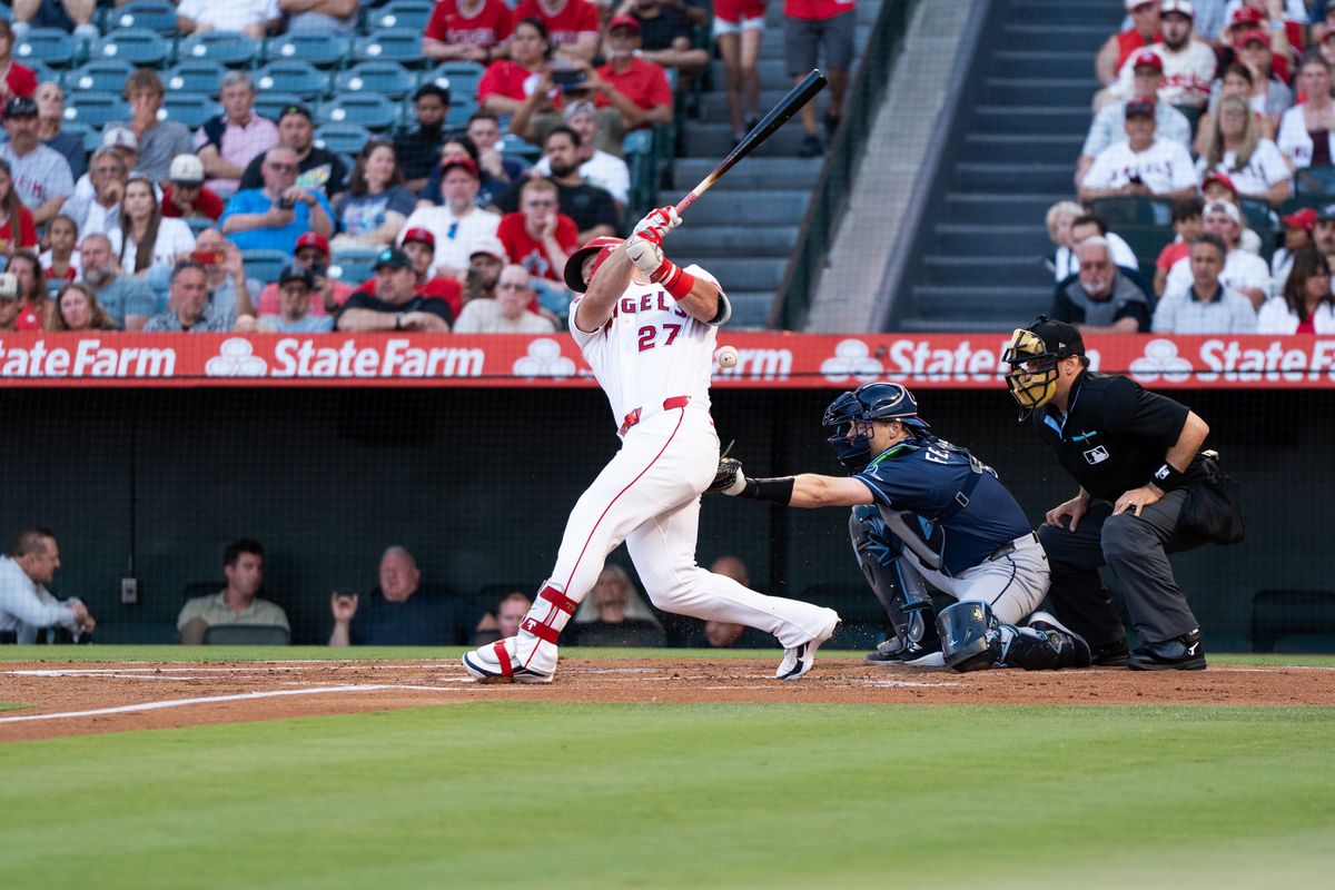 Los Angeles Angels center fielder Mike Trout (27) swings and connects while at bat during an MLB game against the Tampa Bay Rays at Angel Stadium on June 13, 2026, in Anaheim, California.