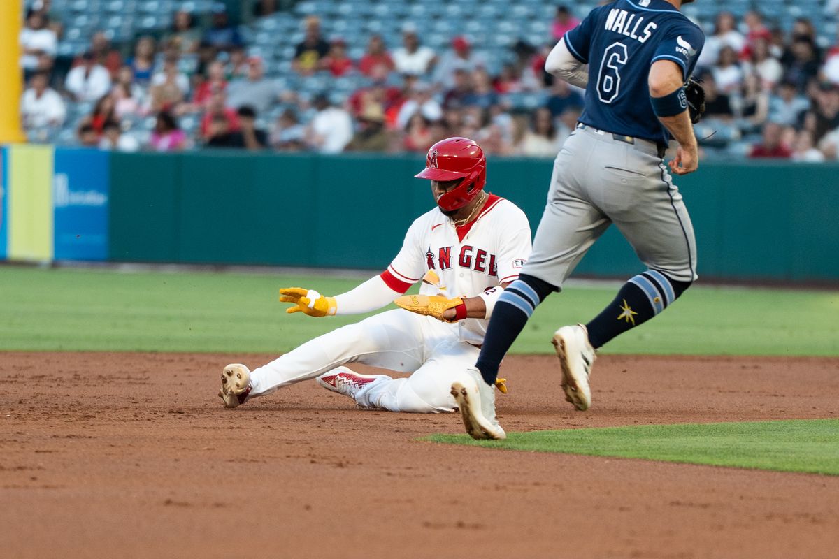 Los Angeles Angels SS Denzer Guzman (23) slides into second and is safe during an MLB game against the Tampa Bay Rays at Angel Stadium on June 13, 2026, in Anaheim, California.