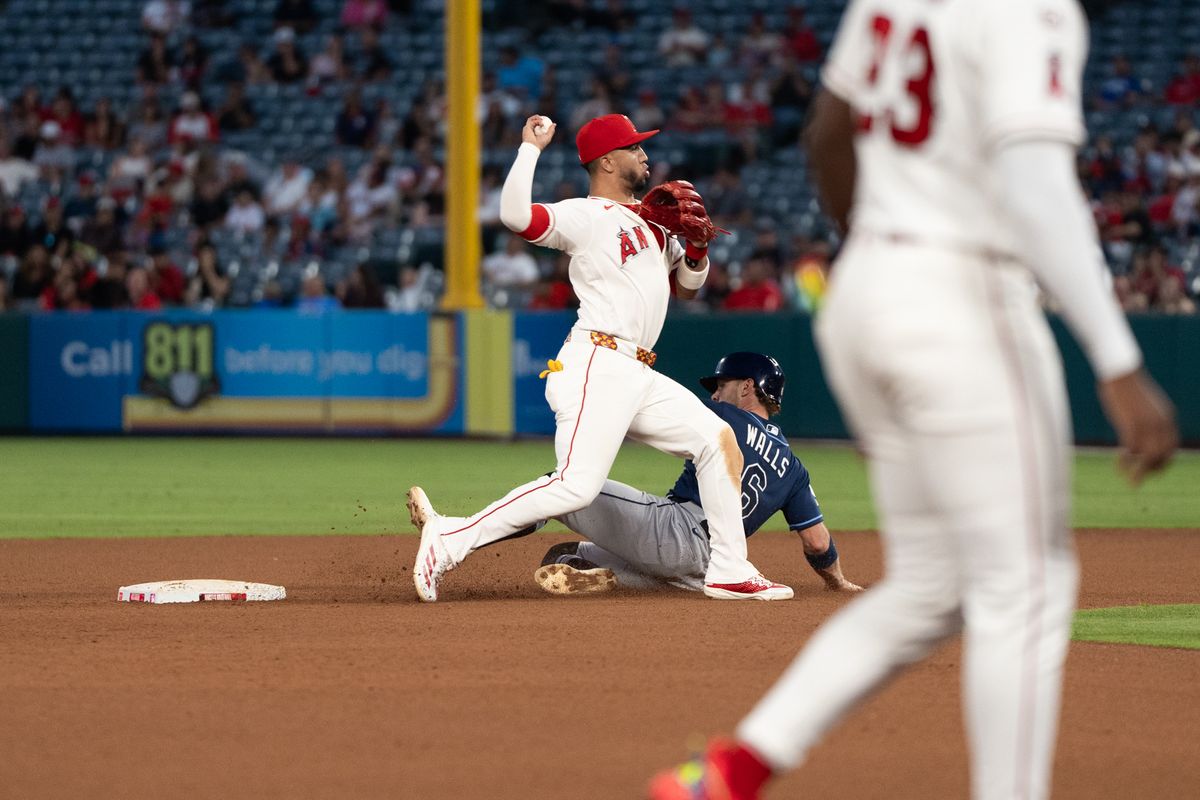 Los Angeles Angels 2B Oswald Peraza (2) starts a double play during an MLB game against the Tampa Bay Rays at Angel Stadium on June 13, 2026, in Anaheim, California.
