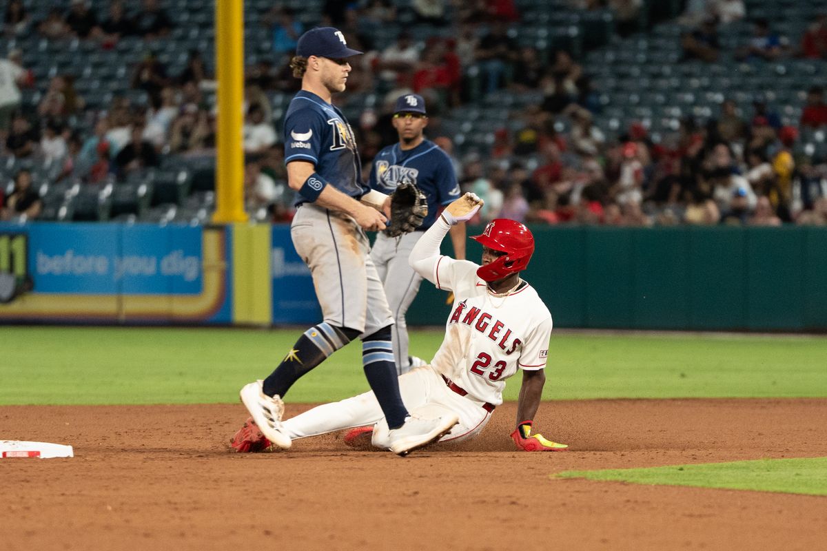 Los Angeles Angels SS Denzer Guzman (23) slides into second and is safe during an MLB game against the Tampa Bay Rays at Angel Stadium on June 13, 2026, in Anaheim, California.
