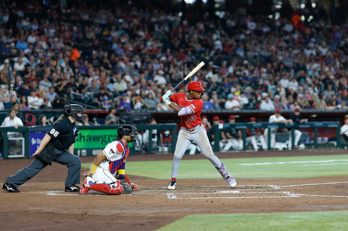 Denzer Guzman #23 of the Los Angeles Angels bats against the Arizona Diamondbacks at Chase Field on June 16, 2026 in Phoenix, Arizona. Denzer Guzman #23 of the Los Angeles Angels bats against the Arizona Diamondbacks at Chase Field on June 16, 2026 in Phoenix, Arizona.