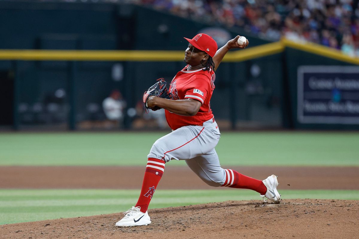 Jose Fermin #65 of the Los Angeles Angels throws a pitch against the Arizona Diamondbacks at Chase Field on June 16, 2026 in Phoenix, Arizona. Jose Fermin #65 of the Los Angeles Angels throws a pitch against the Arizona Diamondbacks at Chase Field on June 16, 2026 in Phoenix, Arizona.