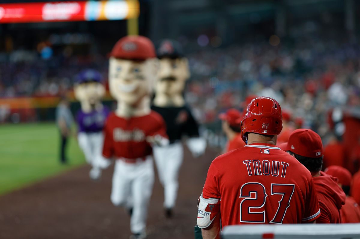 Mike Trout #27 of the Los Angeles Angels in the dugout against the Arizona Diamondbacks at Chase Field on June 16, 2026 in Phoenix, Arizona. Mike Trout #27 of the Los Angeles Angels in the dugout against the Arizona Diamondbacks at Chase Field on June 16, 2026 in Phoenix, Arizona.