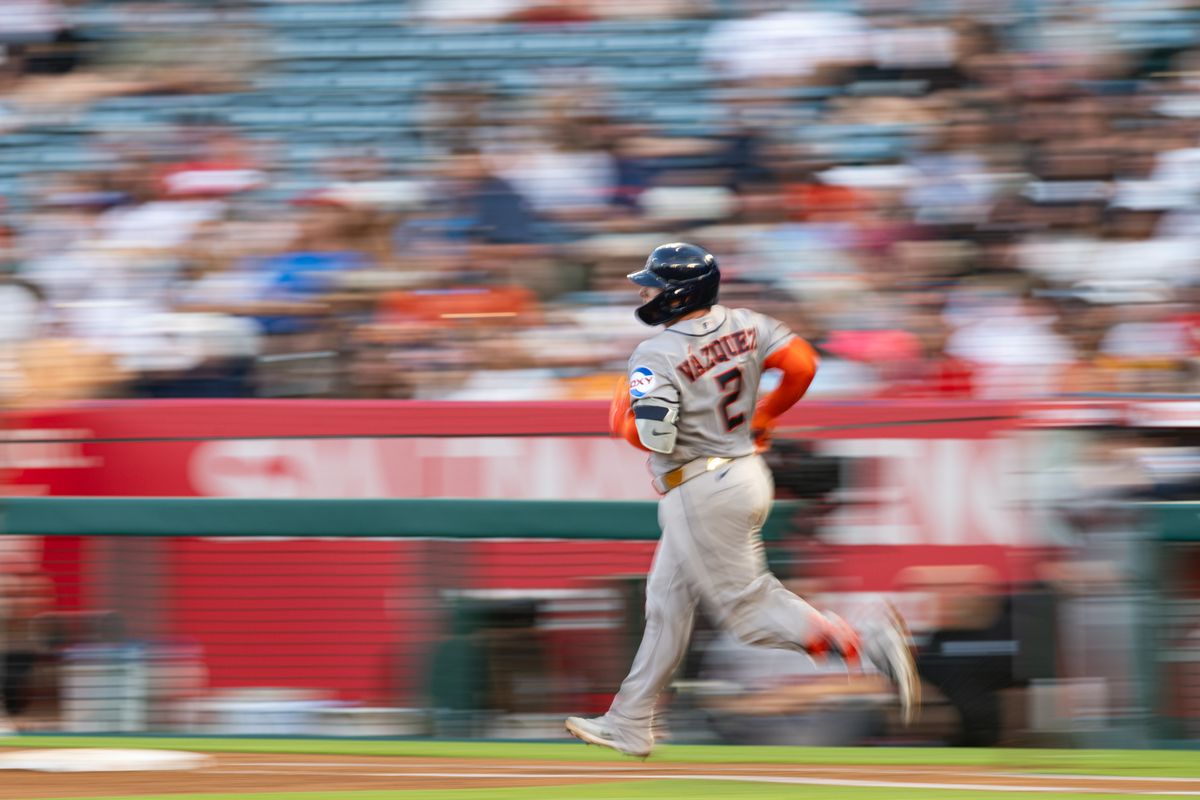 Houston Astros catcher Christian Vazquez (2) runs to first base during a game between the Houston Astros and the Los Angeles Angels on Monday, July 27, 2026 at Angels Stadium in Anaheim Calif.