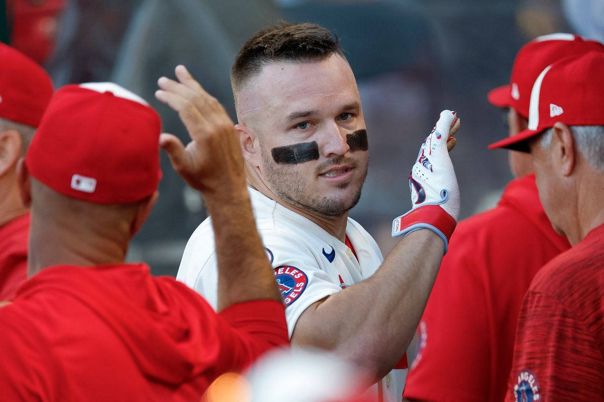 Mike Trout #27 of the Los Angeles Angels celebrates after scoring a run against the Milwaukee Brewers on August 1, 2026 at Angel Stadium in Anaheim, California. Mike Trout #27 of the Los Angeles Angels celebrates after scoring a run against the Milwaukee Brewers on August 1, 2026 at Angel Stadium in Anaheim, California.