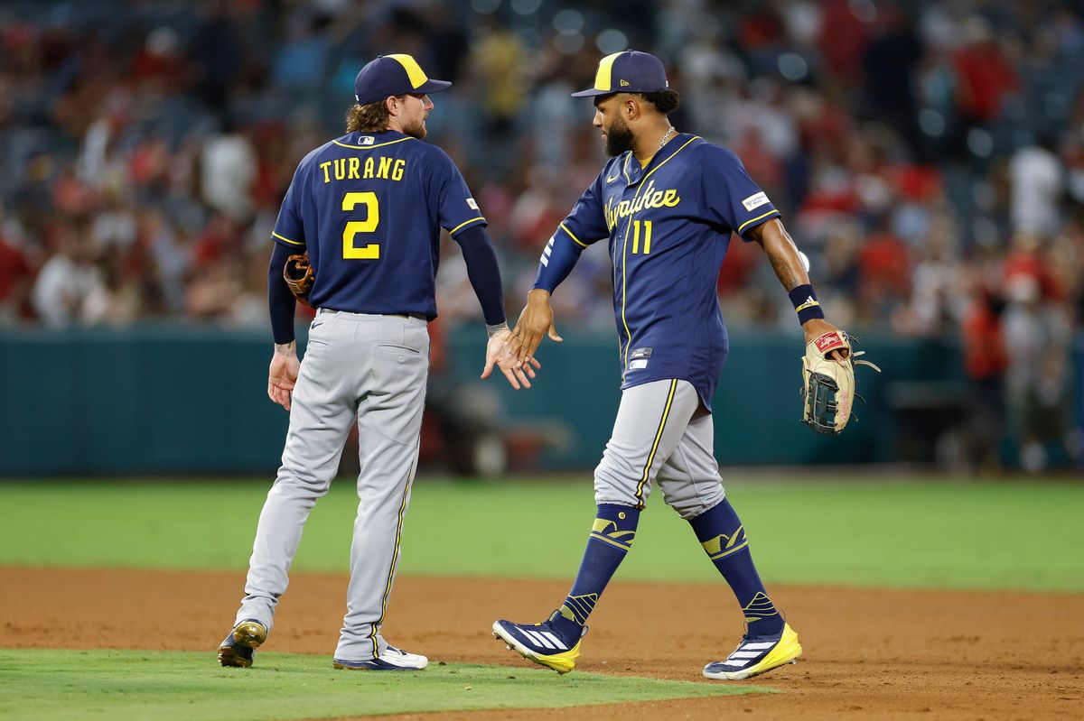 Jackson Chourio #11 of the Milwaukee Brewers celebrates with Brice Turang #2 after a team victory over the Los Angeles Angels on August 1, 2026 at Angel Stadium in Anaheim, California. Jackson Chourio #11 of the Milwaukee Brewers celebrates with Brice Turang #2 after a team victory over the Los Angeles Angels on August 1, 2026 at Angel Stadium in Anaheim, California.