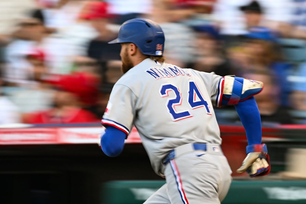 Texas Rangers right outfielder Brandon Nimmo (24) runs to first base after making contact during a game between the Texas Rangers and the Los Angeles Angels on Tuesday, August 11, 2026 at Angels Stadium in Anaheim Calif. Texas Rangers right outfielder Brandon Nimmo (24) runs to first base after making contact during a game between the Texas Rangers and the Los Angeles Angels on Tuesday, August 11, 2026 at Angels Stadium in Anaheim Calif.