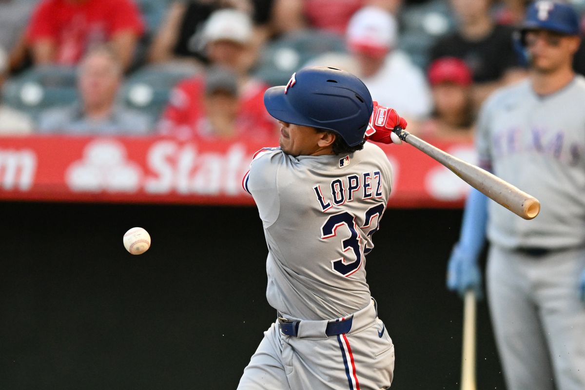 Texas Rangers second baseman Nicky Lopez (33) swings and hits a foul ball during a game between the Texas Rangers and the Los Angeles Angels on Tuesday, August 11, 2026 at Angels Stadium in Anaheim Calif. Texas Rangers second baseman Nicky Lopez (33) swings and hits a foul ball during a game between the Texas Rangers and the Los Angeles Angels on Tuesday, August 11, 2026 at Angels Stadium in Anaheim Calif.
