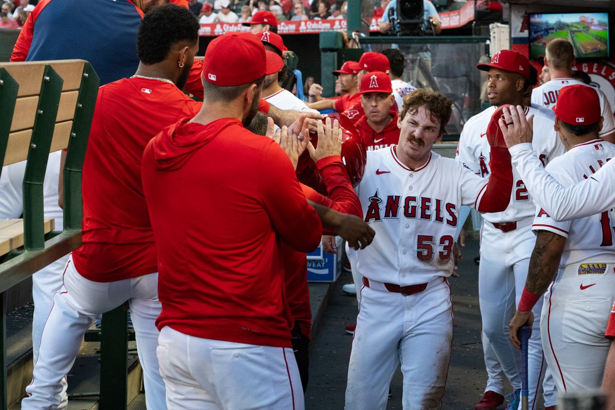 Los Angeles Angels left outfielder Wade Meckler (53) gives out high fives after scoring during a game between the Texas Rangers and the Los Angeles Angels on Tuesday, August 11, 2026 at Angels Stadium in Anaheim Calif. Los Angeles Angels left outfielder Wade Meckler (53) gives out high fives after scoring during a game between the Texas Rangers and the Los Angeles Angels on Tuesday, August 11, 2026 at Angels Stadium in Anaheim Calif.