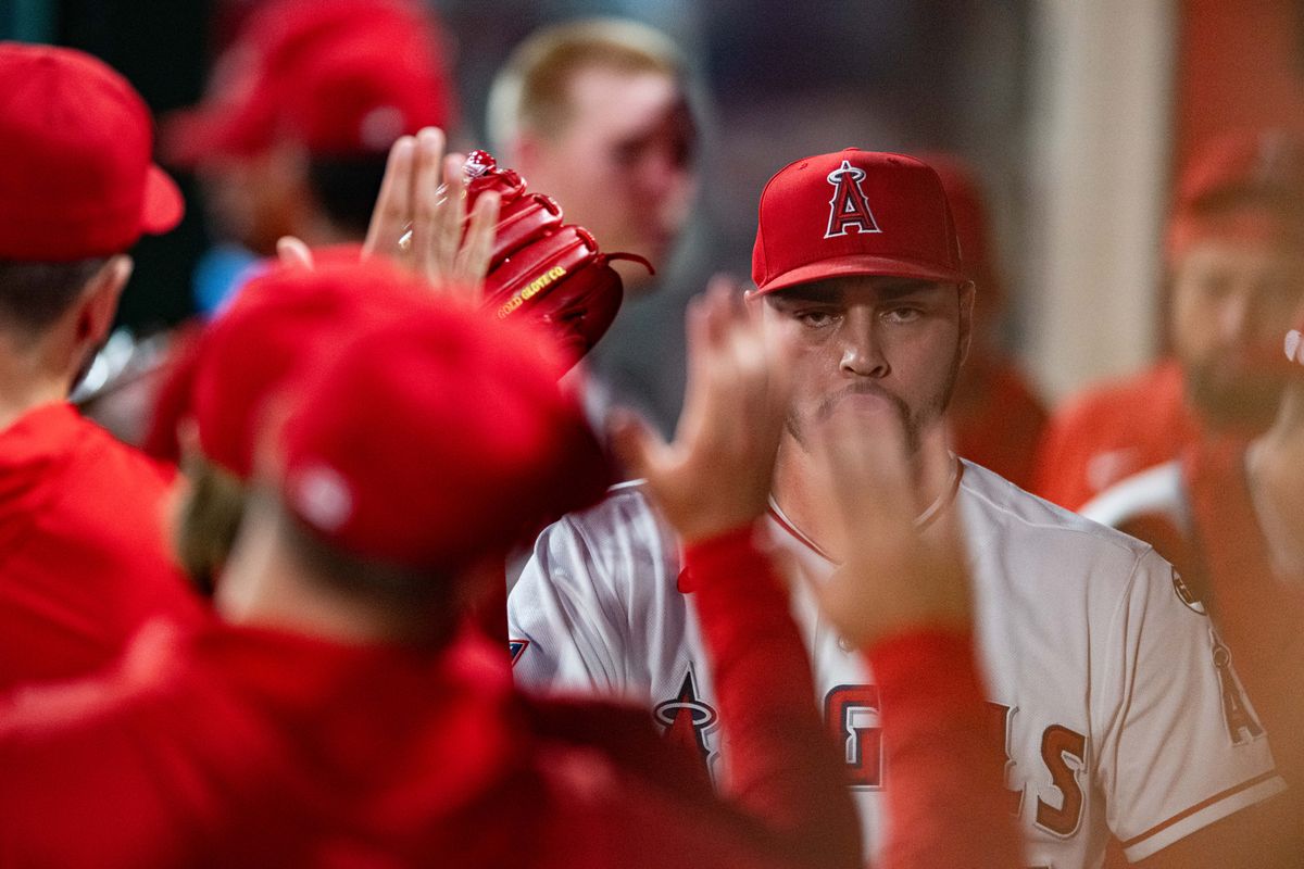 Los Angeles relief pitcher Tyler Saucedo (55) gives out high five after an inning during a game between the Texas Rangers and the Los Angeles Angels on Tuesday, August 11, 2026 at Angels Stadium in Anaheim Calif. Los Angeles relief pitcher Tyler Saucedo (55) gives out high five after an inning during a game between the Texas Rangers and the Los Angeles Angels on Tuesday, August 11, 2026 at Angels Stadium in Anaheim Calif.