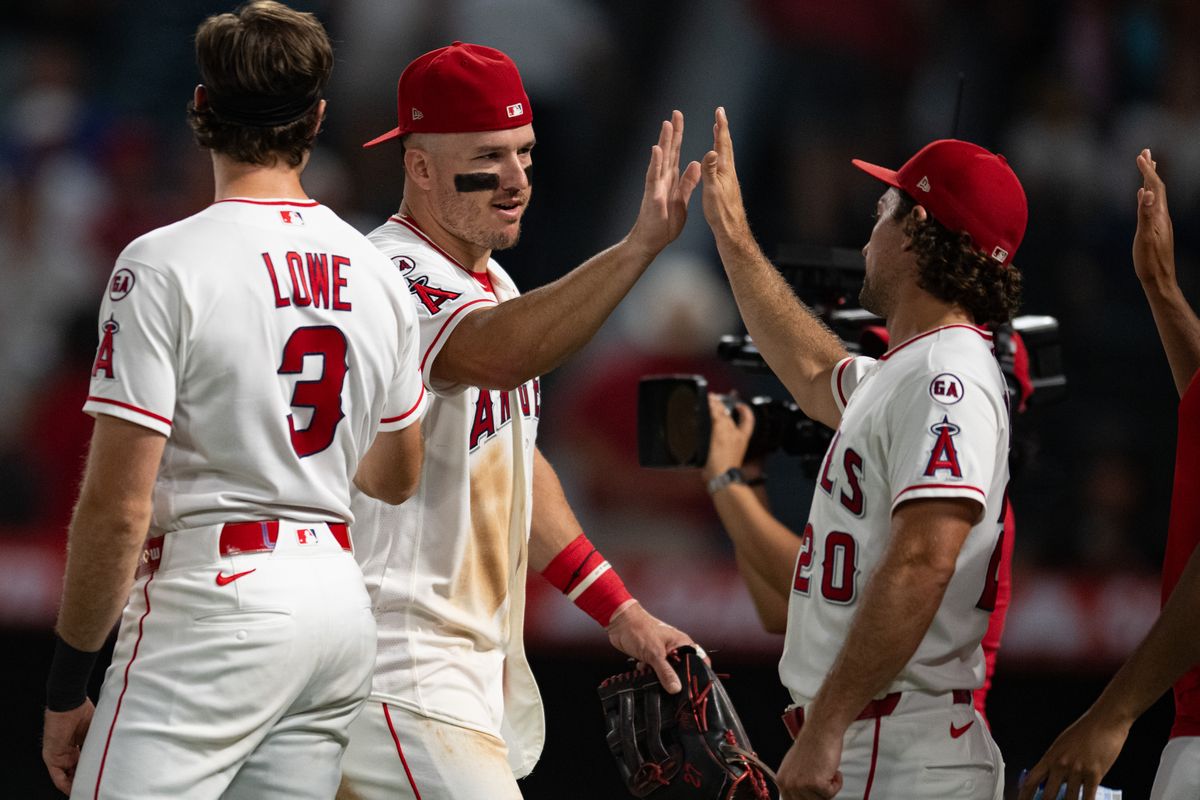Los Angeles Angels center outfielder Mike Trout (27) celebrates after a game between the Texas Rangers and the Los Angeles Angels on Tuesday, August 11, 2026 at Angels Stadium in Anaheim Calif. Los Angeles Angels center outfielder Mike Trout (27) celebrates after a game between the Texas Rangers and the Los Angeles Angels on Tuesday, August 11, 2026 at Angels Stadium in Anaheim Calif.