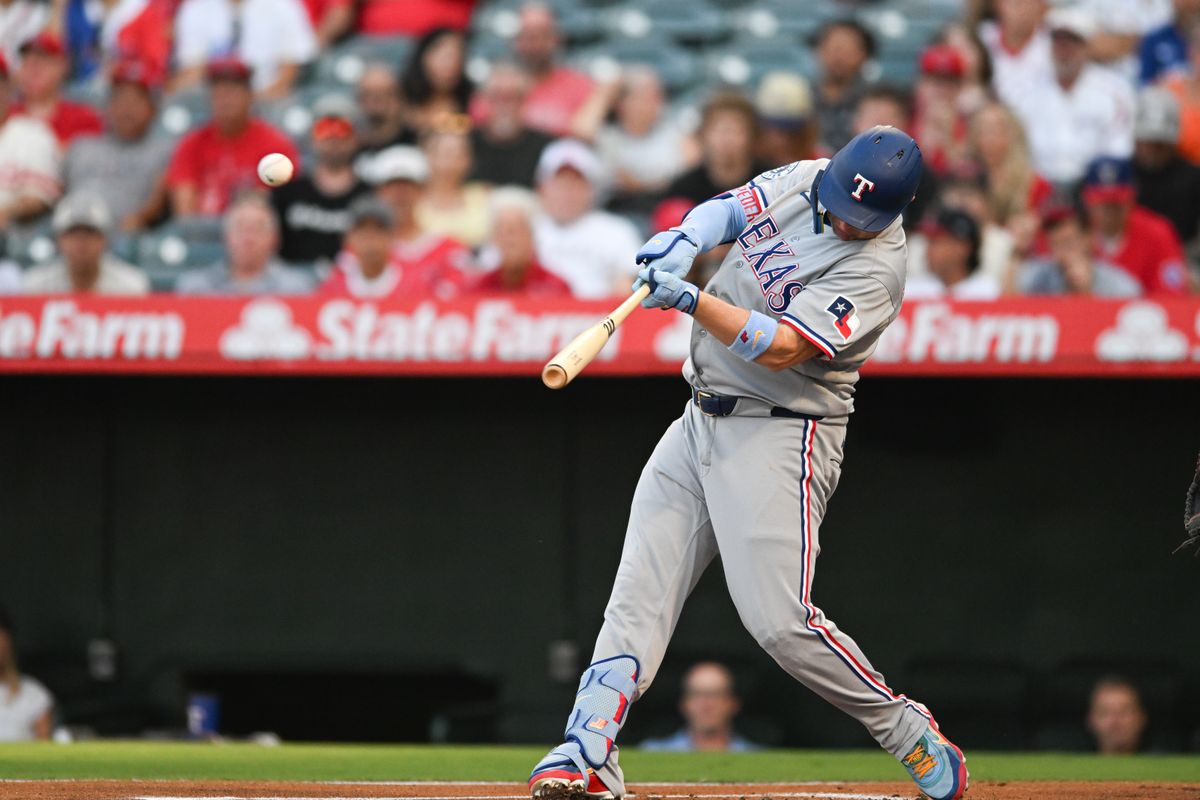 Texas Rangers second baseman Nicky Lopez (33) sings and makes contact during a game between the Texas Rangers and the Los Angeles Angels on Tuesday, August 11, 2026 at Angels Stadium in Anaheim Calif. Texas Rangers second baseman Nicky Lopez (33) sings and makes contact during a game between the Texas Rangers and the Los Angeles Angels on Tuesday, August 11, 2026 at Angels Stadium in Anaheim Calif.