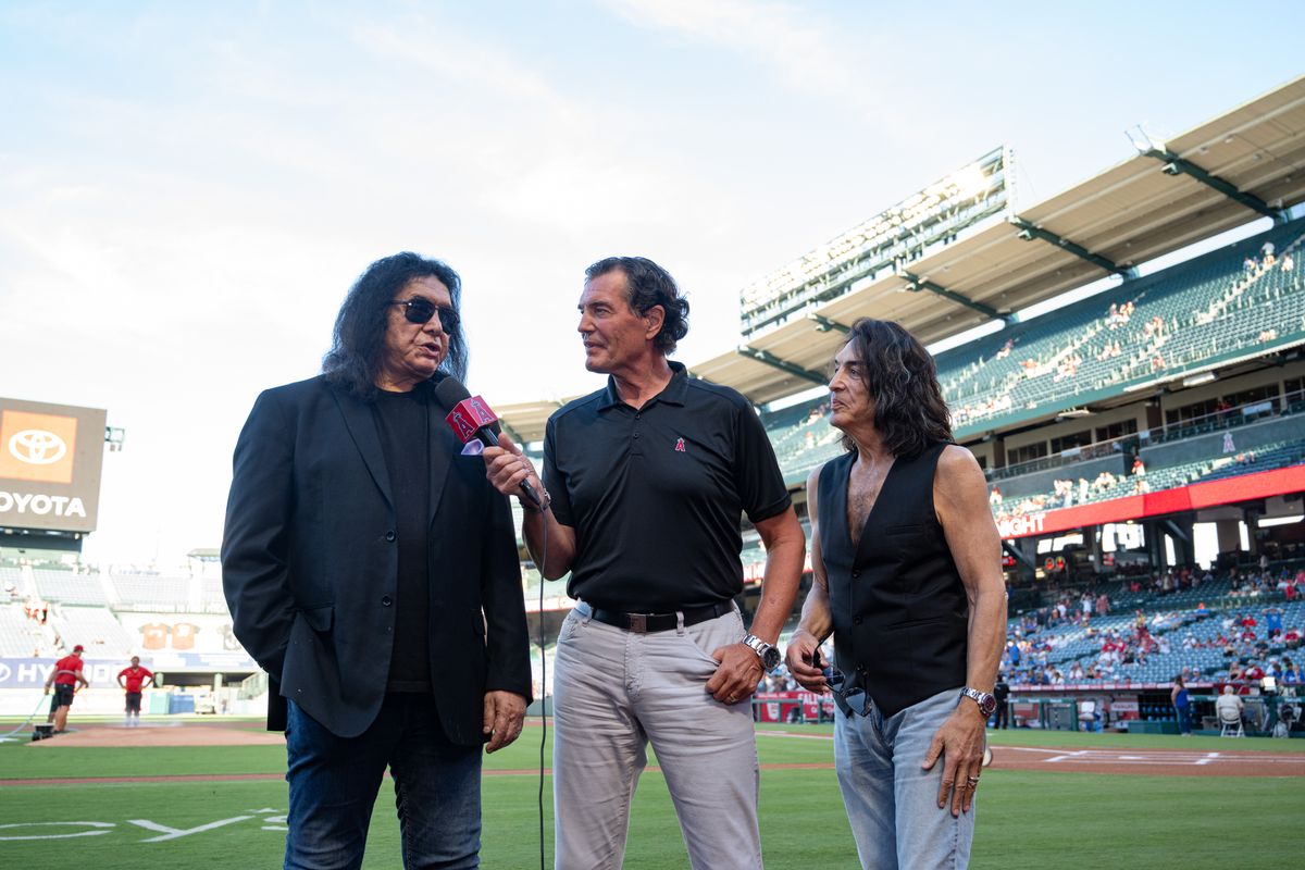 Kiss band members Gene Simmons and Paul Stanley speakse to Mark Gubicza before a game between the Kansas City Royals and the Los Angeles Angels on Saturday, August 15, 2026 at Angel Stadium in Anaheim Calif. Kiss band members Gene Simmons and Paul Stanley speakse to Mark Gubicza before a game between the Kansas City Royals and the Los Angeles Angels on Saturday, August 15, 2026 at Angel Stadium in Anaheim Calif.