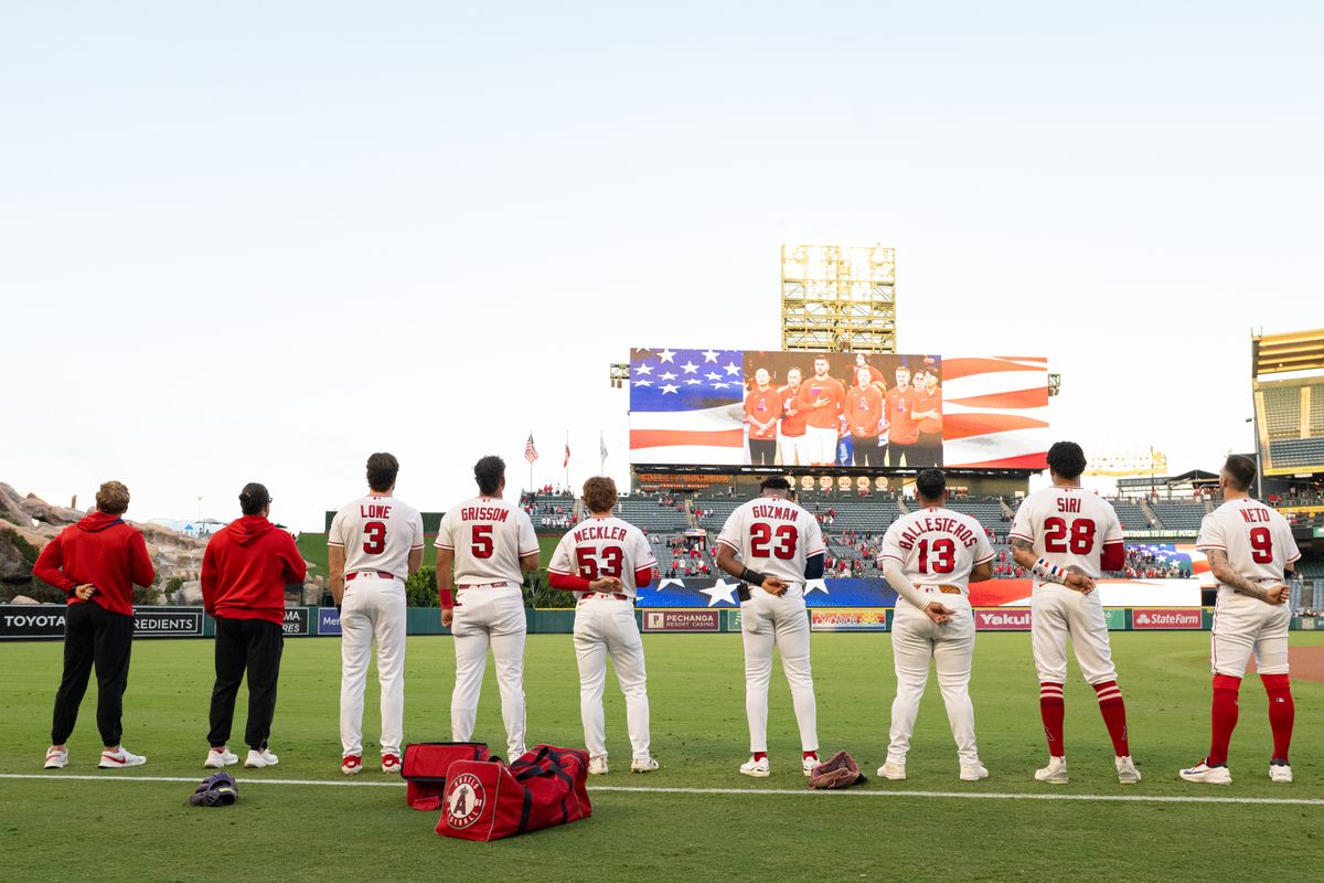 Los Angeles Angels stand during the singing of the national anthem before an MLB match between Minnesota Twins and Los Angeles Angels on Saturday, September 19, 2026 at Angel Stadium in Anaheim, California. Los Angeles Angels stand during the singing of the national anthem before an MLB match between Minnesota Twins and Los Angeles Angels on Saturday, September 19, 2026 at Angel Stadium in Anaheim, California.
