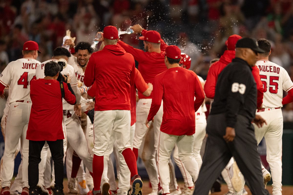 Los Angeles Angels players celebrate after a 10th inning walk off during an MLB match between Minnesota Twins and Los Angeles Angels on Saturday, September 19, 2026 at Angel Stadium in Anaheim, California. Los Angeles Angels players celebrate after a 10th inning walk off during an MLB match between Minnesota Twins and Los Angeles Angels on Saturday, September 19, 2026 at Angel Stadium in Anaheim, California.