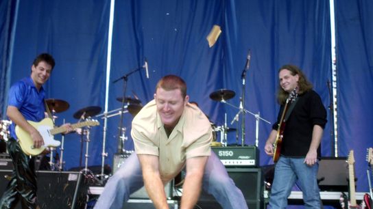 Aug 21,2000; Cleveland, OH, USA; Cleveland Indians designated hitter Jim Thome smashes a guitar during Tribe Jam 2000 at Nautica in the Flats. Mandatory Credit: David Richard-Imagn Images