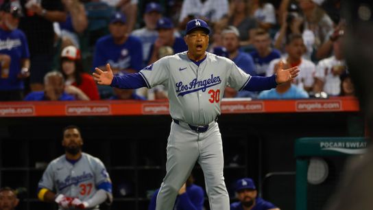 Los Angeles Dodgers manager Dave Roberts disagrees with a call during the during the Freeway Series against the Los Angeles Angels at Angel Stadium on September 3, 2024 in Anaheim, California.