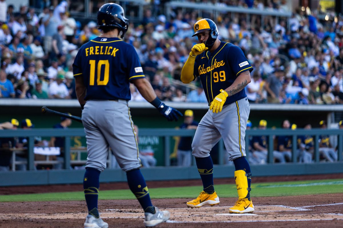 Milwaukee Brewers designated-hitter Gary Sanchez (99) celebrates with Sal Frelick (10) after scoring a run during a MLB game between the The Athletics and the Milwaukee Brewers, Wednesday June 10, 2026 in Las Vegas, Nev. Milwaukee Brewers designated-hitter Gary Sanchez (99) celebrates with Sal Frelick (10) after scoring a run during a MLB game between the The Athletics and the Milwaukee Brewers, Wednesday June 10, 2026 in Las Vegas, Nev.