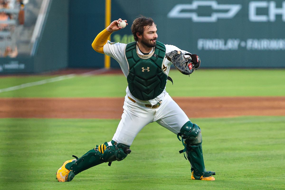Athletics C Shea Langeliers (23) throws the ball to first base during an MLB game against the Colorado Rockies on Friday June 12, 2026, at the Las Vegas Ballpark in Las Vegas, Nevada.