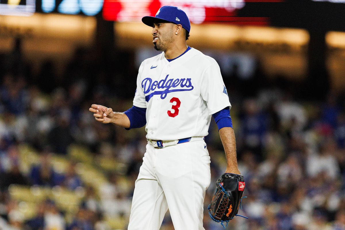 Edwin Díaz #3 of the Los Angeles Dodgers signals a strike during an MLB game against the Texas Rangers at Dodger Stadium on April 10, 2026 in Los Angeles, California.