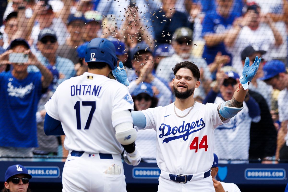 Shohei Ohtani #17 of the Los Angeles Dodgers celebrates his home run with Andy Pages #44 of the Los Angeles Dodgers during the game against the Texas Rangers at Dodger Stadium on April 12, 2026 in Los Angeles, California.
