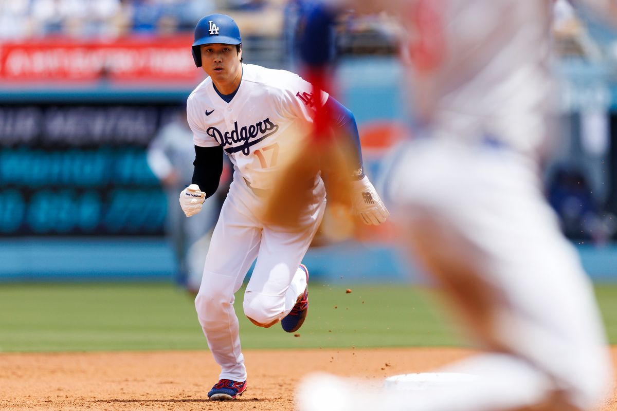 Shohei Ohtani #17 of the Los Angeles Dodgers runs during the game against the Chicago Cubs at Dodger Stadium on April 26, 2026 in Los Angeles, California.